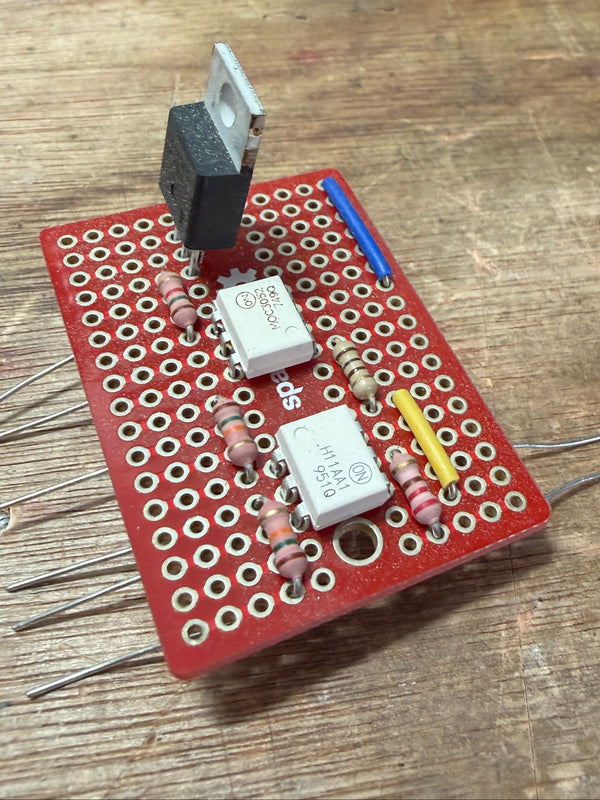 Electronic circuit board with components on a wooden surface
